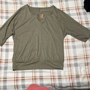 brand unknown,soft material,olive green with a gold accent in the front